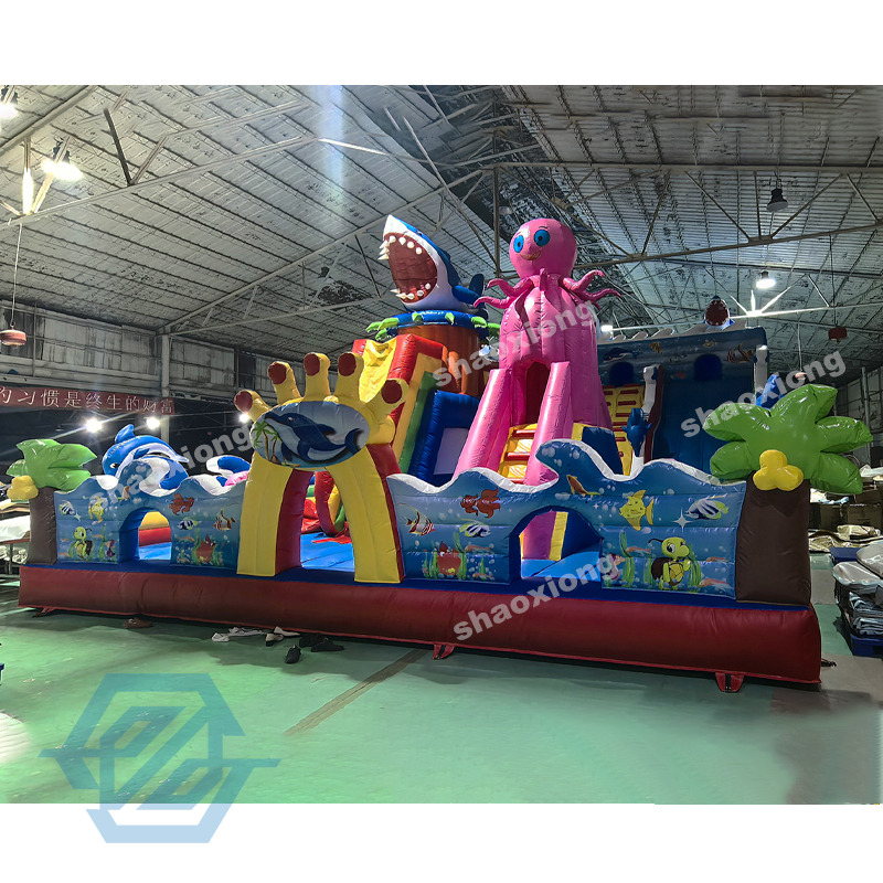  Parco giochi gonfiabile per parco tematico oceanico con scivolo da arrampicata