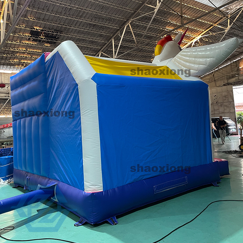 Casa inflable de rebote con tema de caballo arco&iacute;ris y tobog&aacute;n