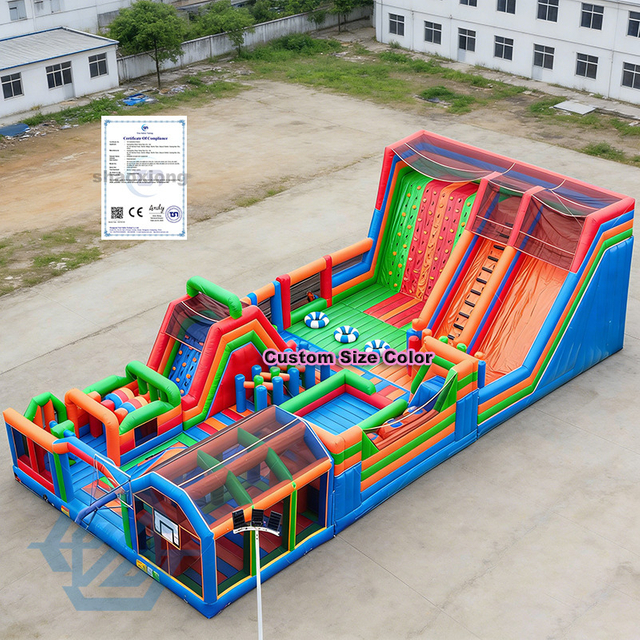  Parco giochi gonfiabile con scivolo a ostacoli in vendita